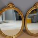 Paire de miroirs oval  doré vintage