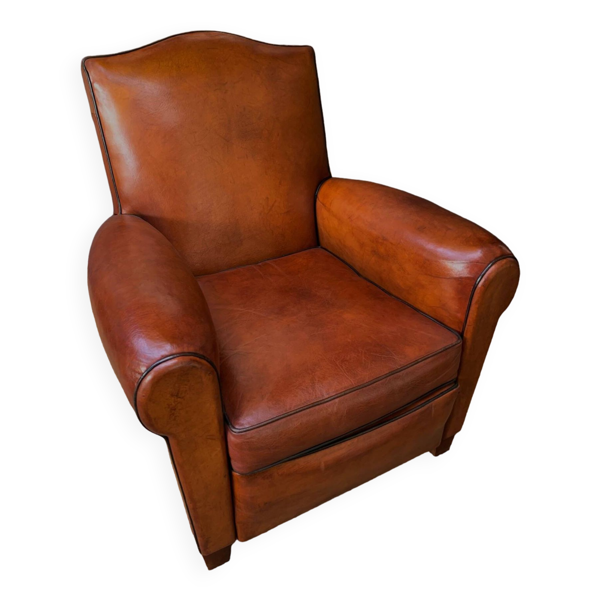 French leather club chair, chapeau de gendarme model circa 1930's in caramel