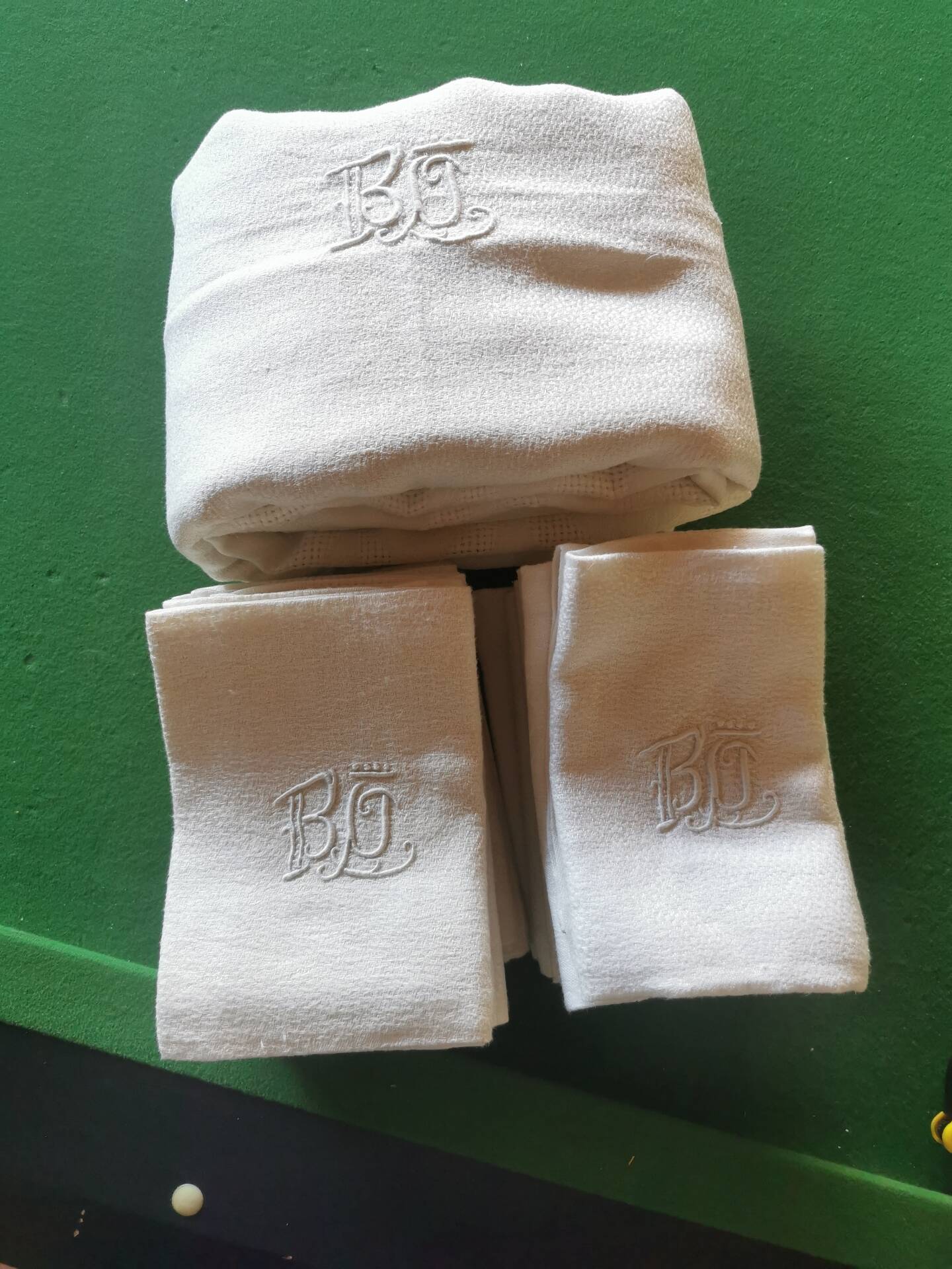 Set of 16 table napkins and an old floral damask tablecloth.