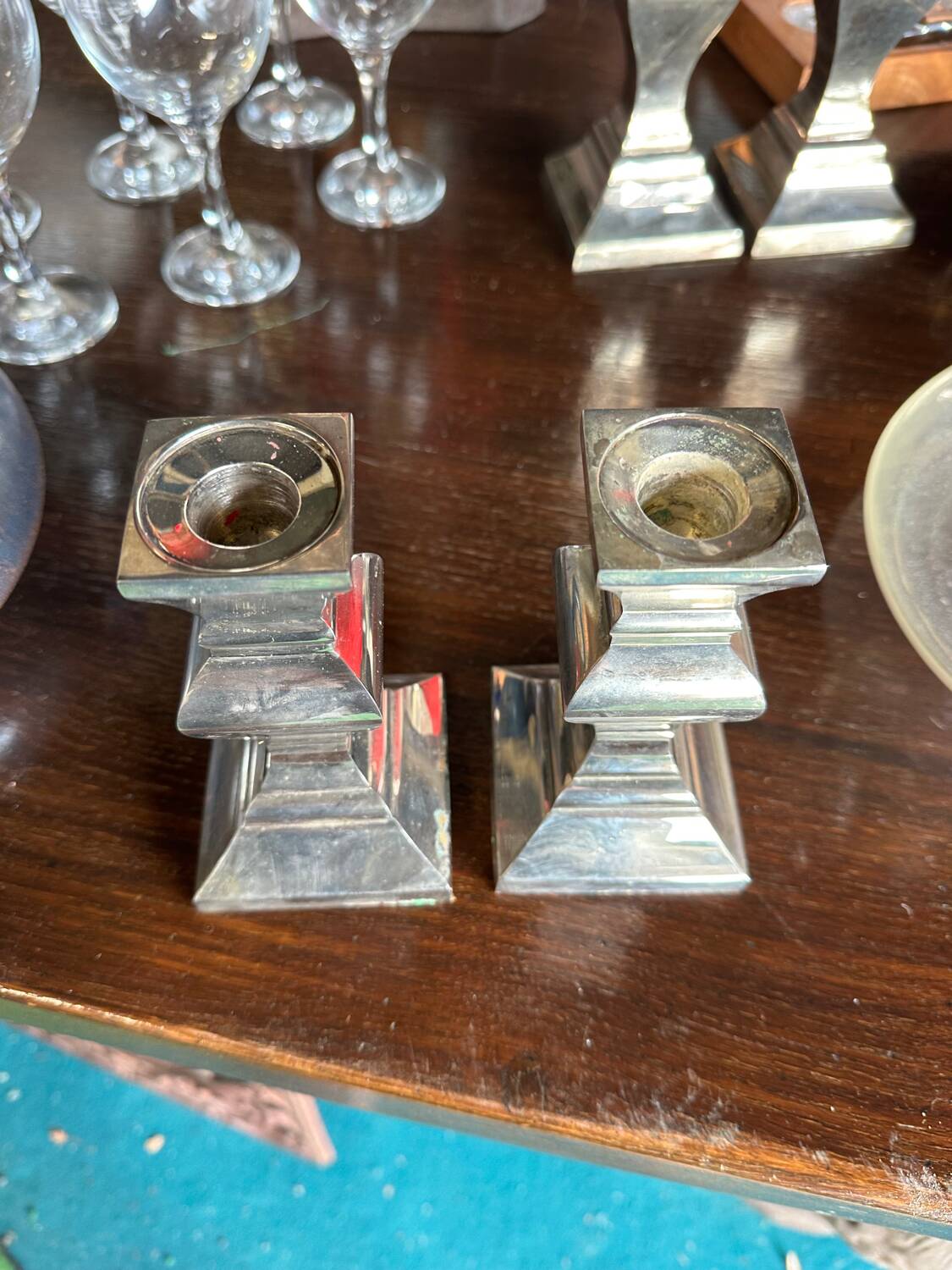 Pair of silver-plated metal candlesticks