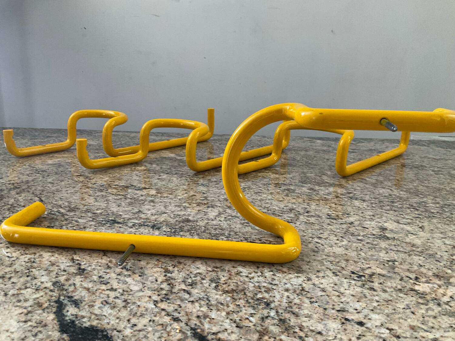 Series of 4 “Taka” hooks by Cesar Rota Nodari Acerbis