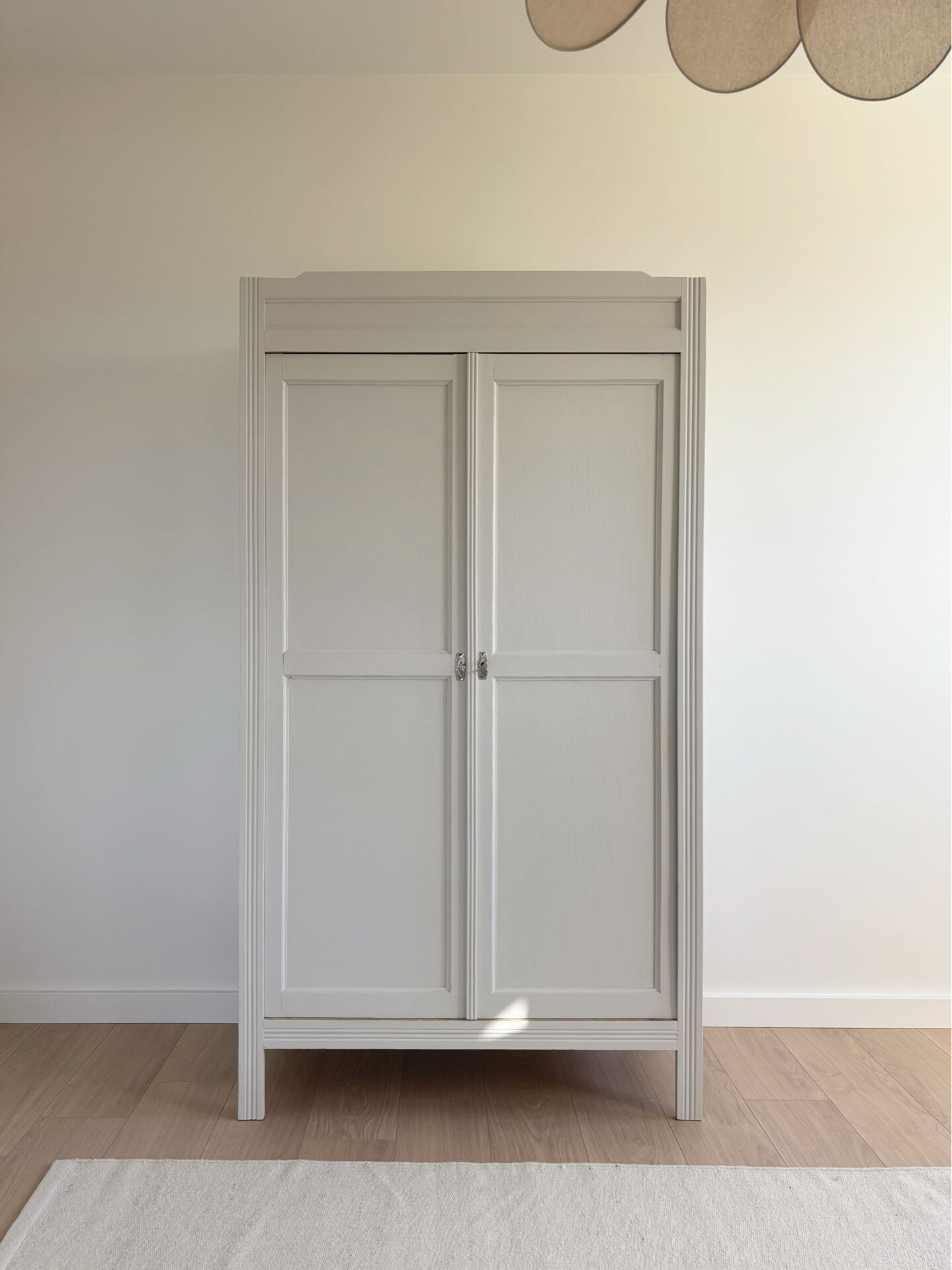 Large Parisian wardrobe in renovated oak wood.