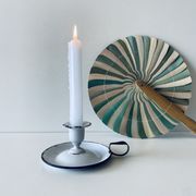 Antique candle holder in white and blue enamelled metal
