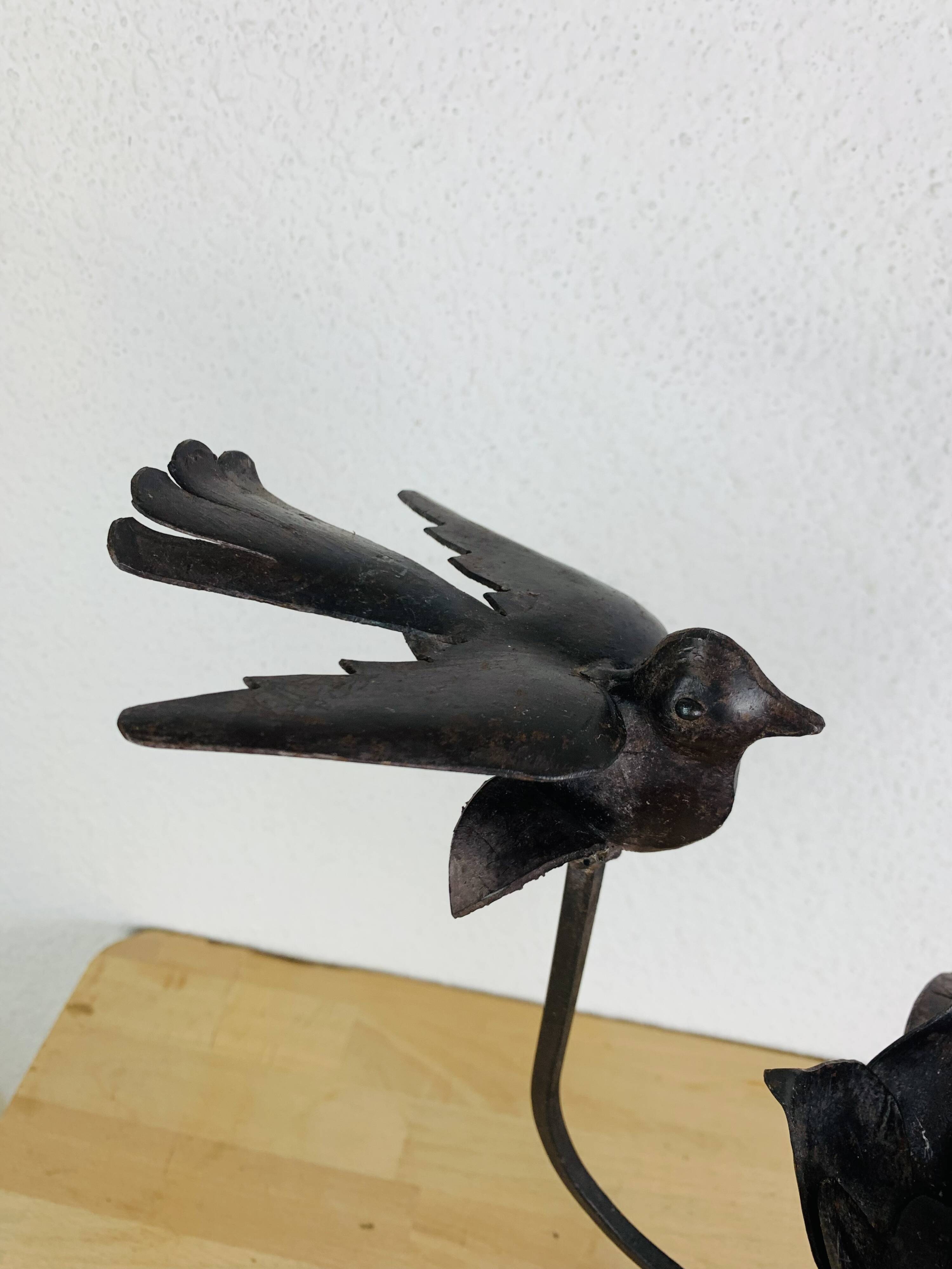 Brutalist wrought iron candle holder with birds