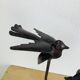 Brutalist wrought iron candle holder with birds
