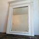 Beveled fireplace mirror