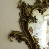 Louis XV style mirror, with bronze frame.