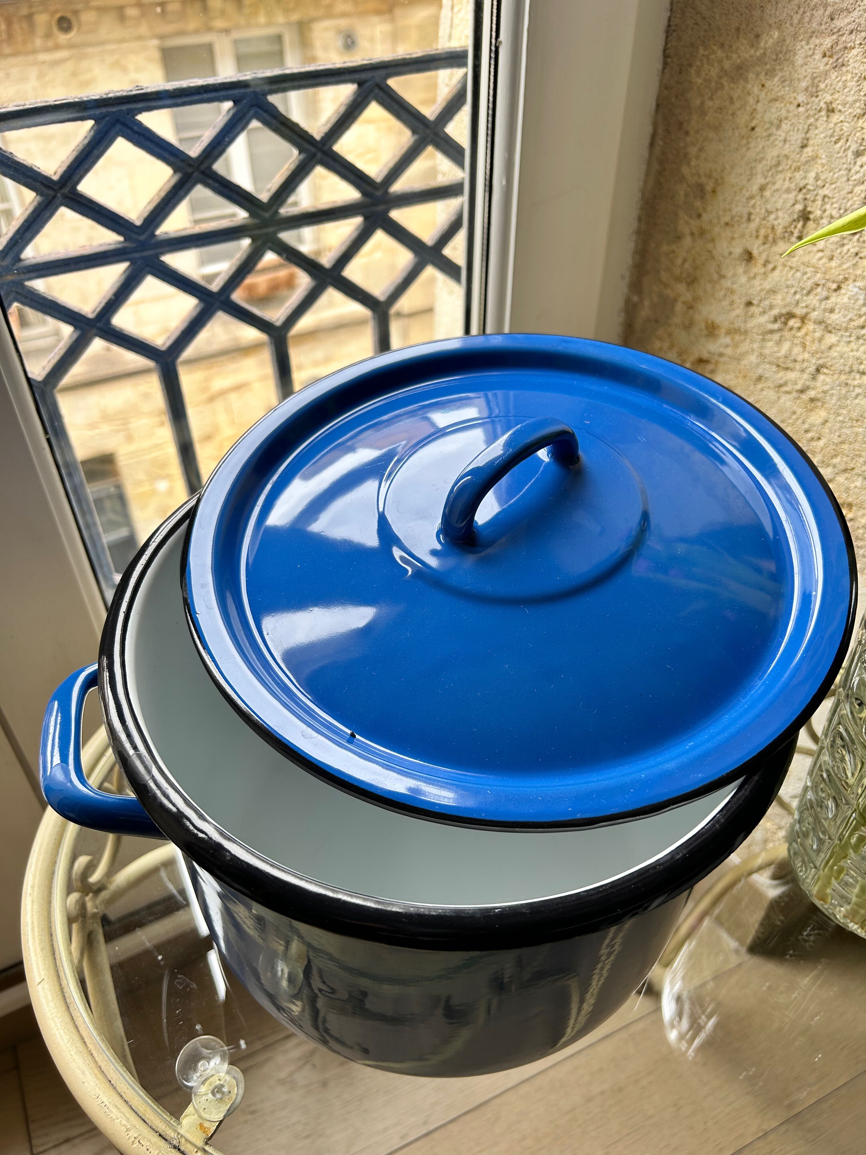 Vintage pot in enamelled sheet metal