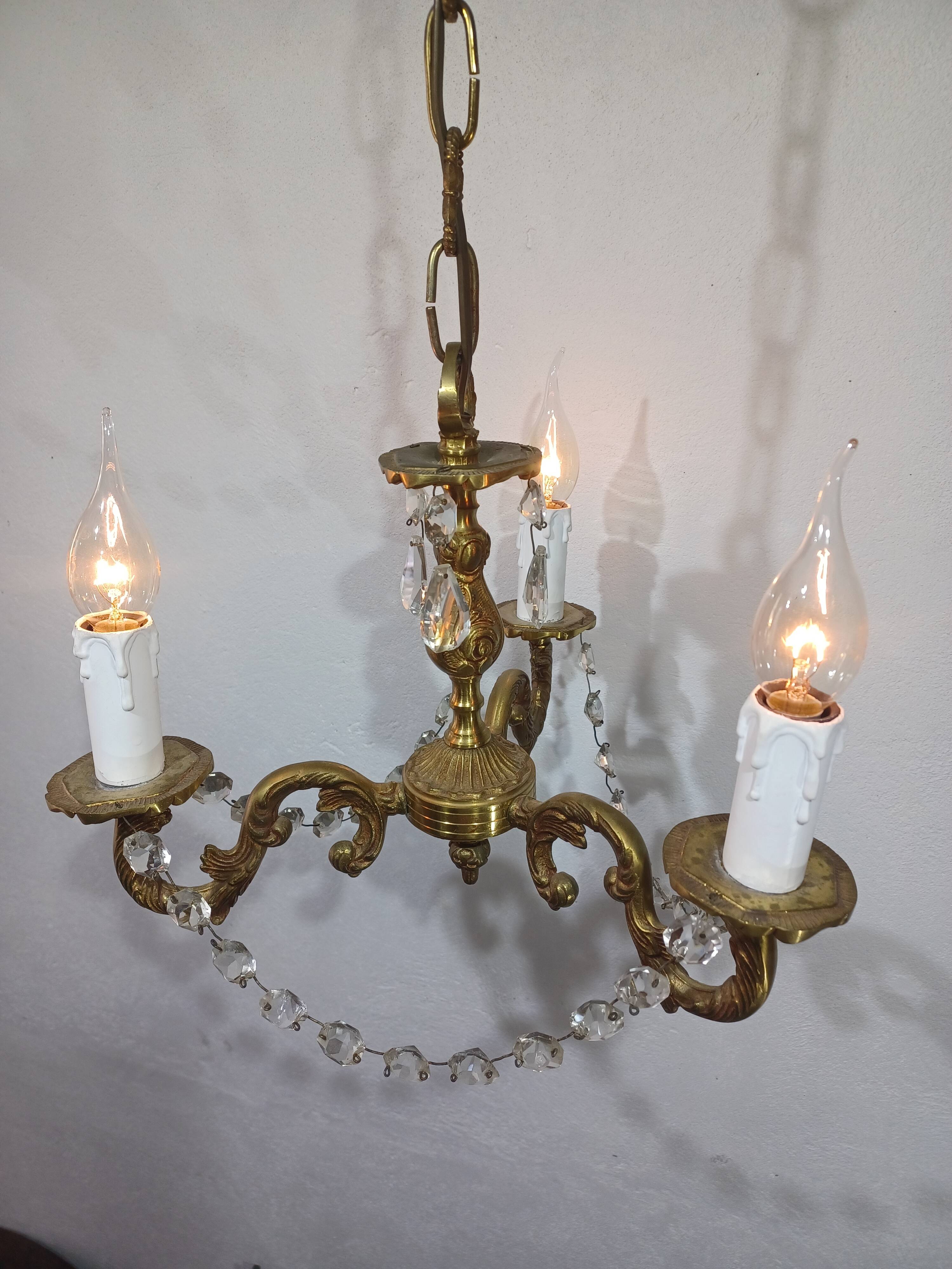3-light bronze and crystal chandelier