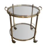 Neoclassical style rolling table in brass