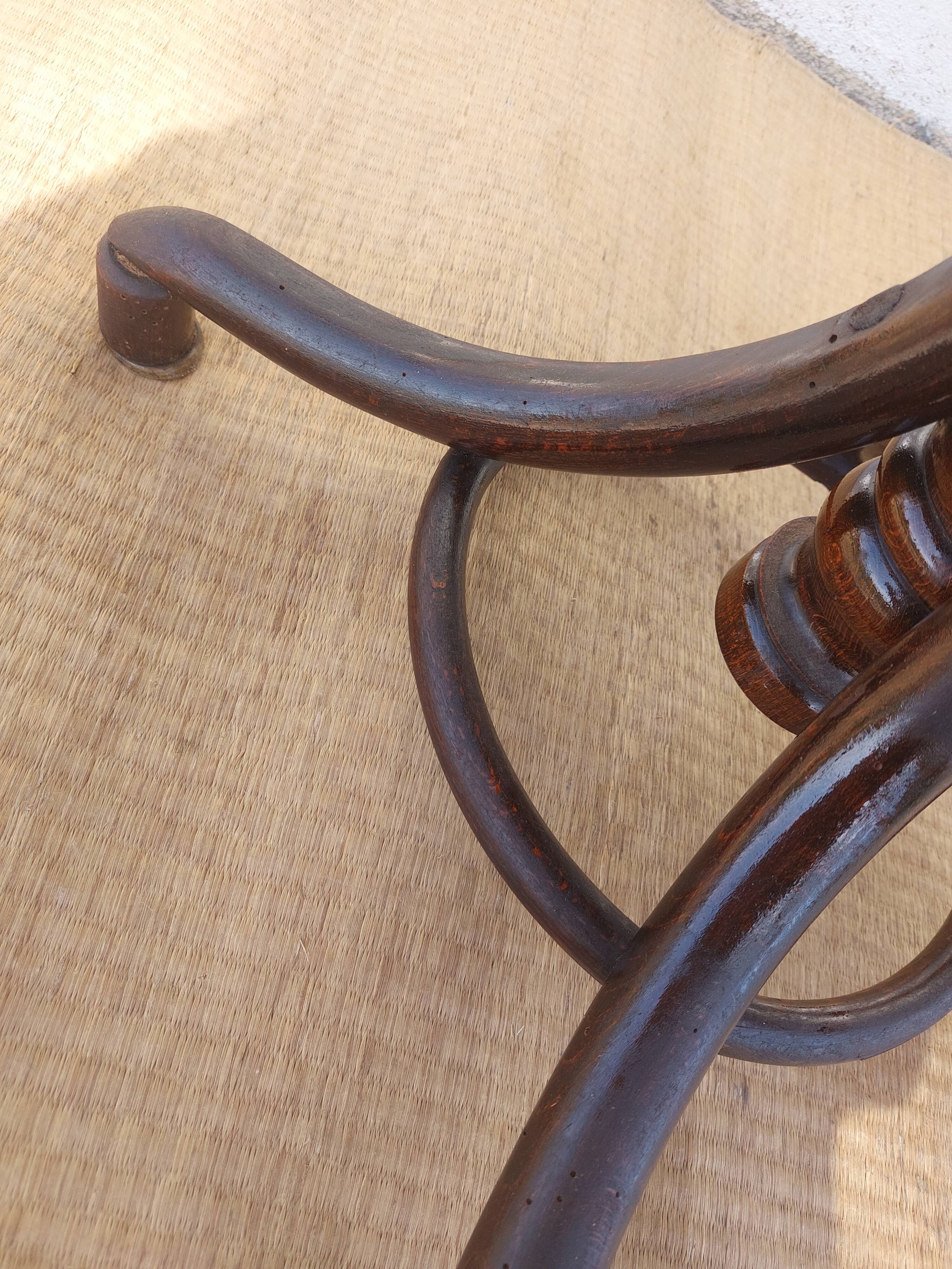 Swivel wooden armchair, pattern on seat