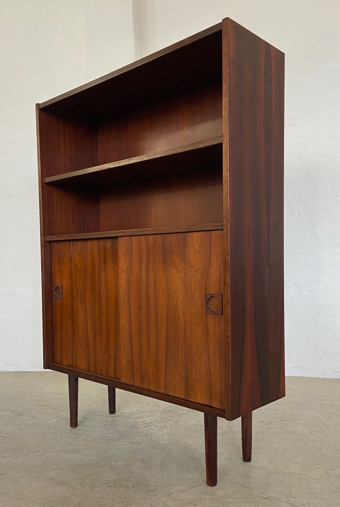 Danish retro vintage library in rosewood with sliding doors from the 1960s.