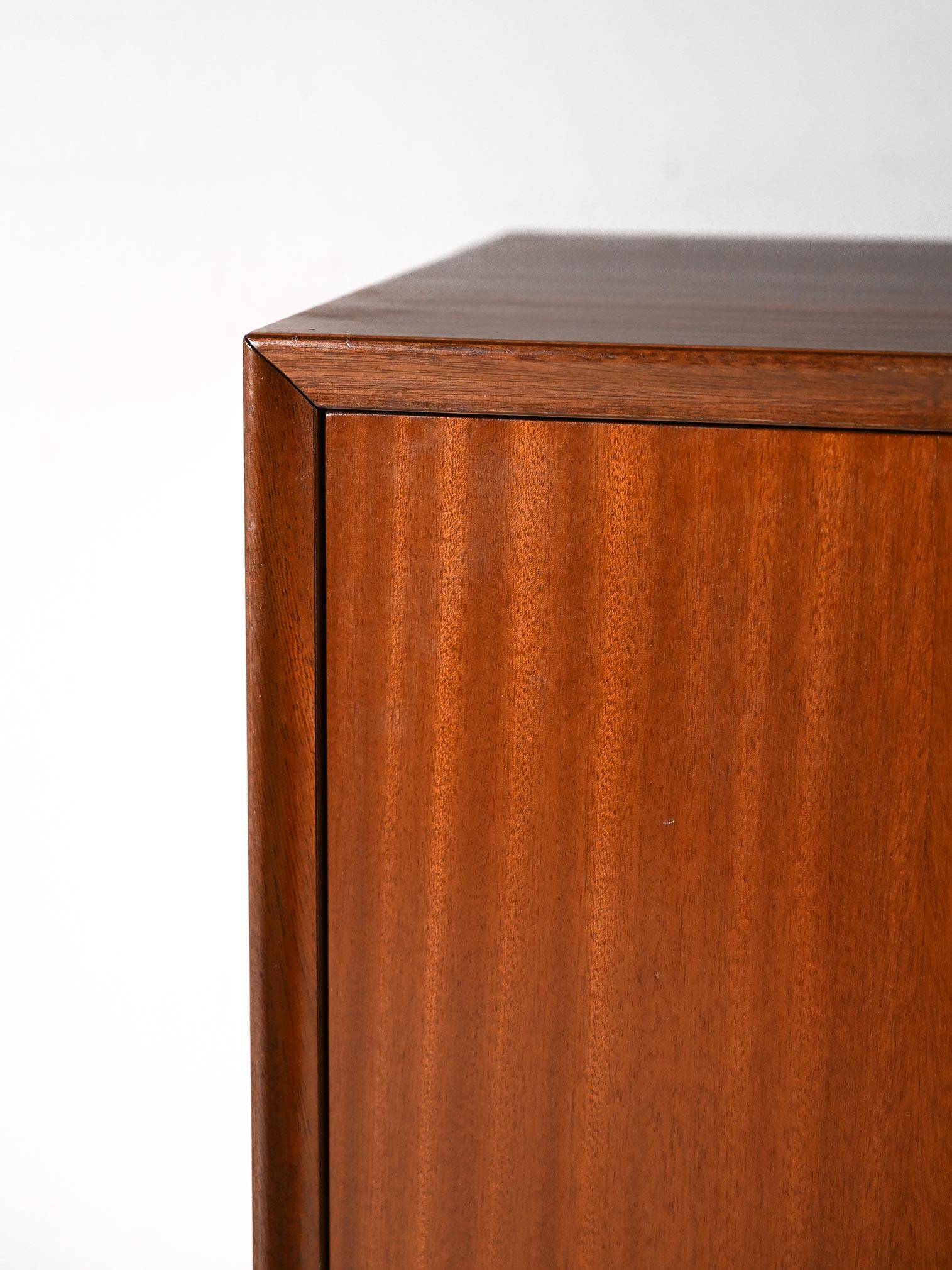 Storage cabinet with hinged doors