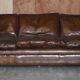 Restored leather mid-century modern low sofa