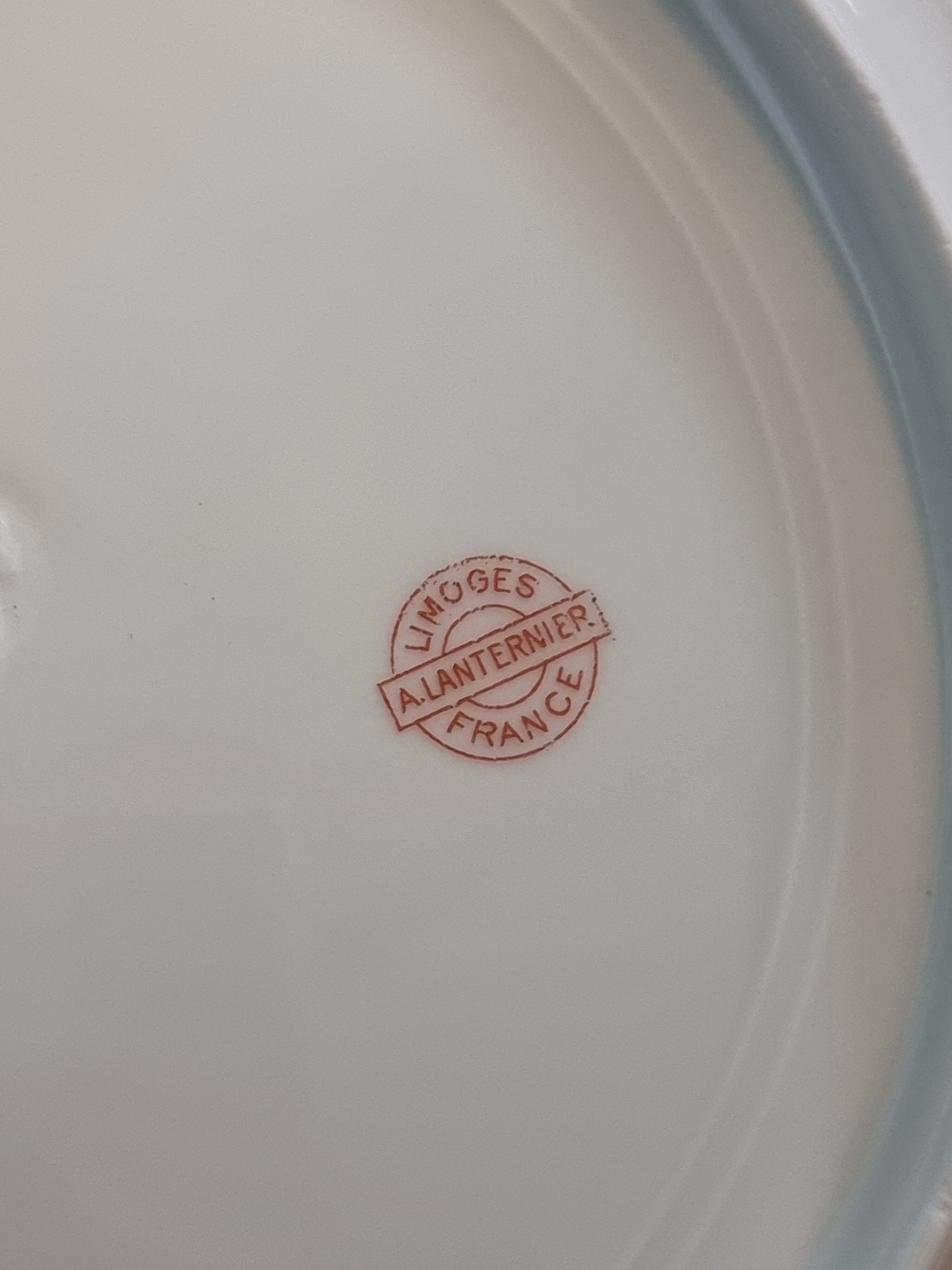 Set of eight Limoges porcelain plates