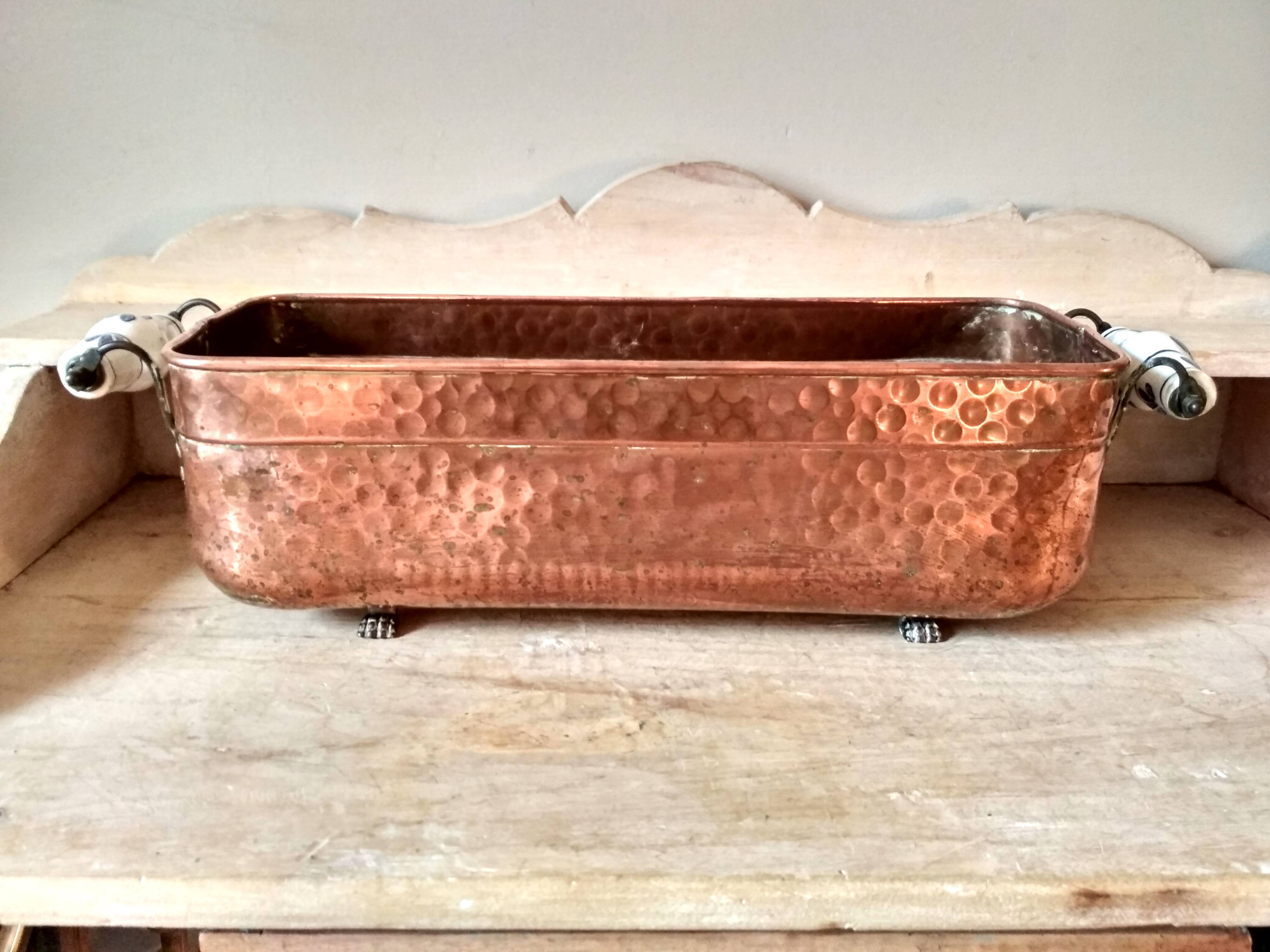 Large brass and copper planter, tray on 4 lion paw feet