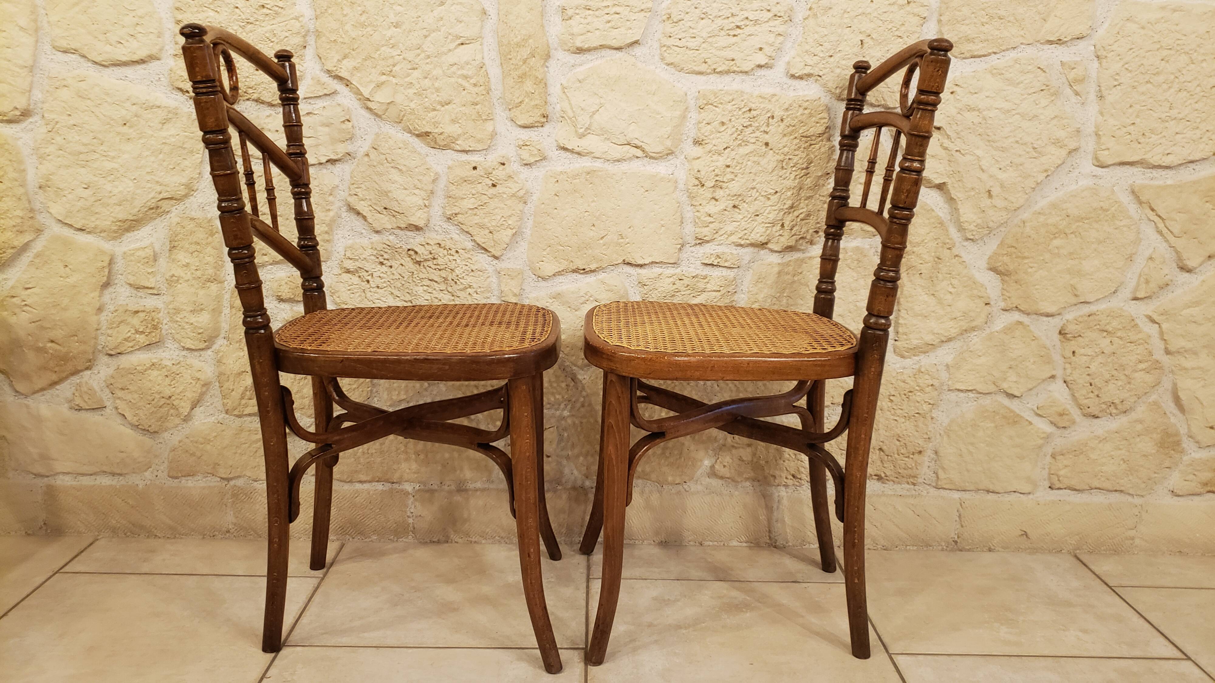 Pairs of old caned bistro chairs cambier n°229