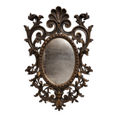 Miroir ancien de style Louis XV à décor de rinceaux, coquilles et feuillages