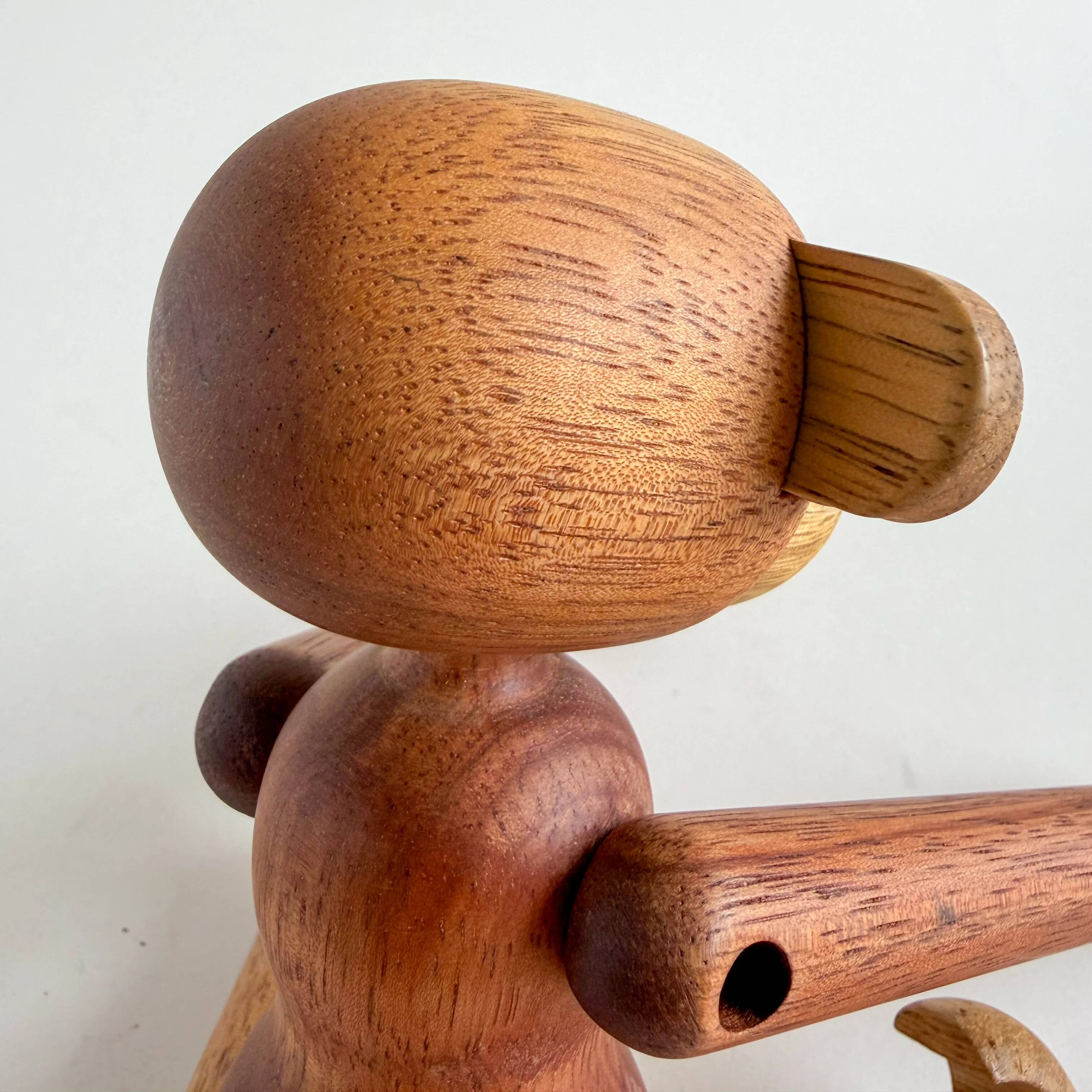 Teak monkey figurine