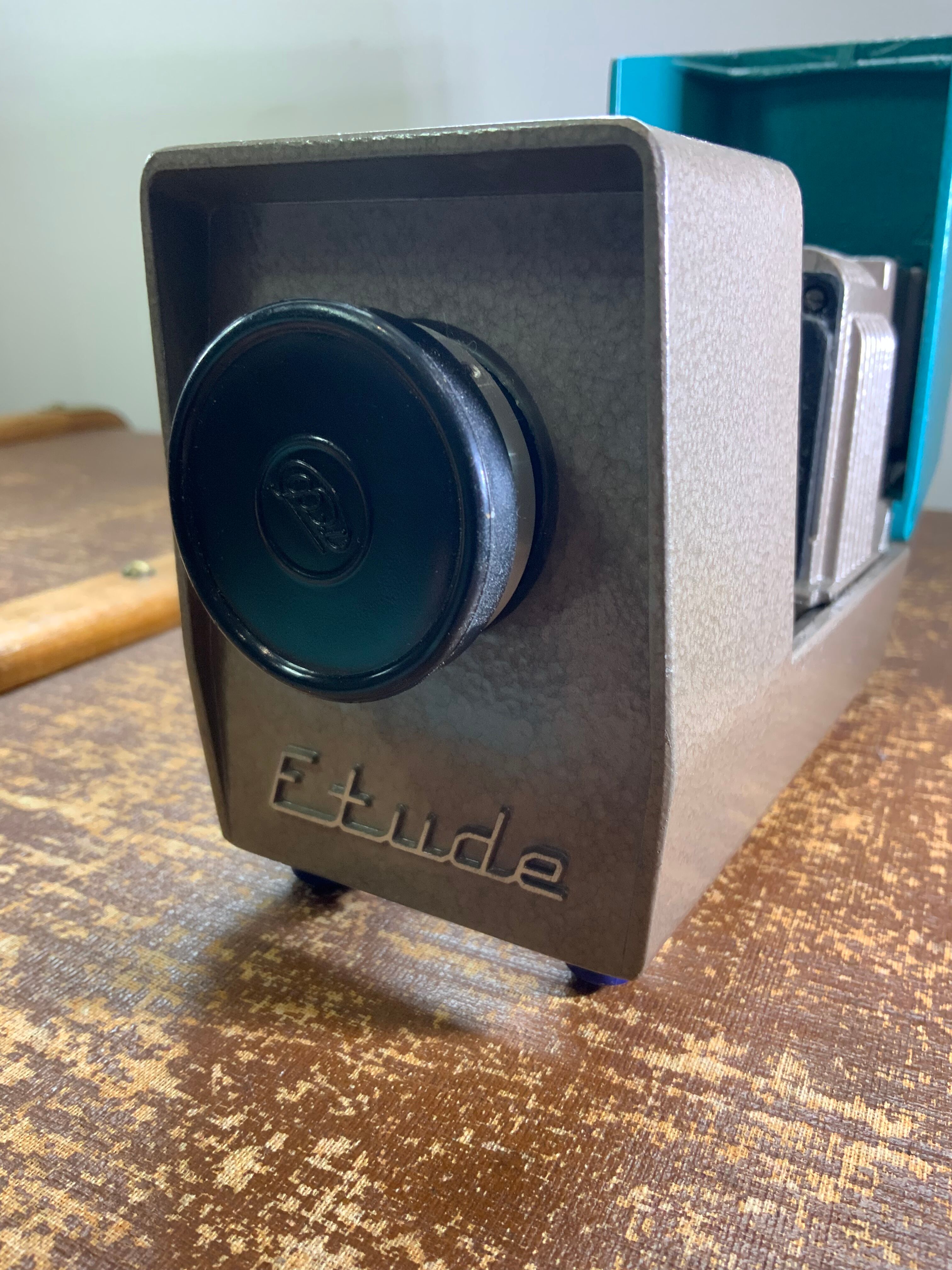 Vintage USSR slide projector in metal enamel blue and gray brand Optical study bulb