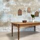 Vintage farmhouse table with turned legs.