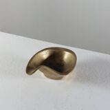 Vintage brass ashtray with an organic design from the 1950s.