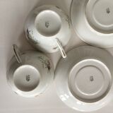 Duo of white Limoges porcelain cups with flowers