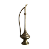 Decorative decanter in brass