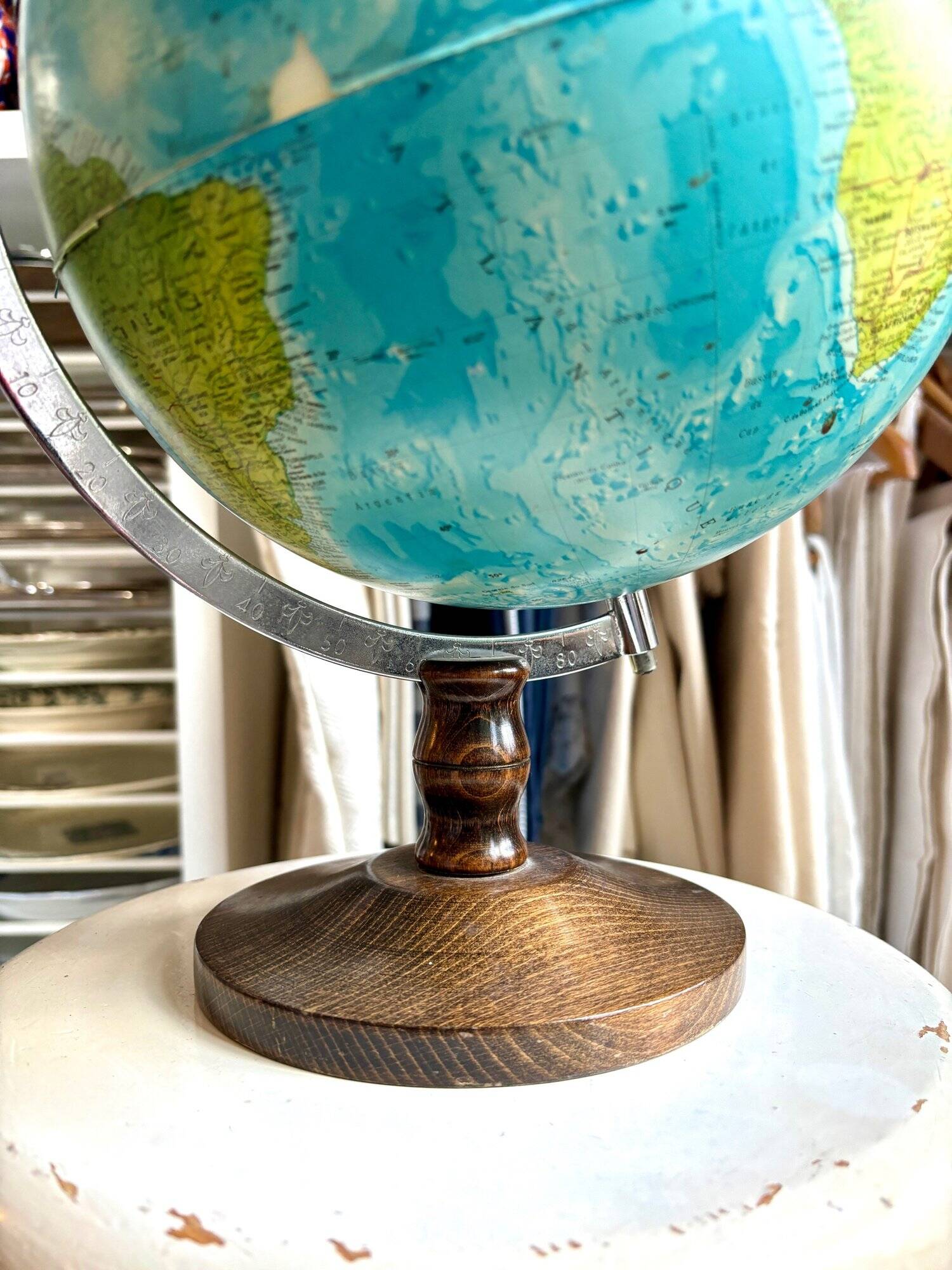 World map, globe with wooden base