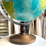 World map, globe with wooden base