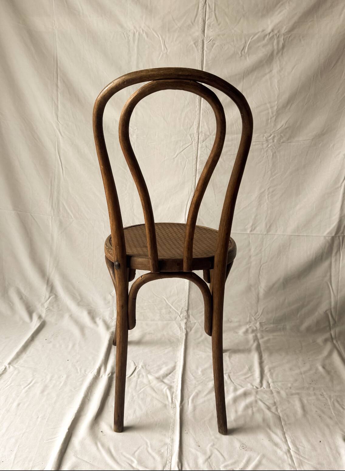 Aged bistro chair