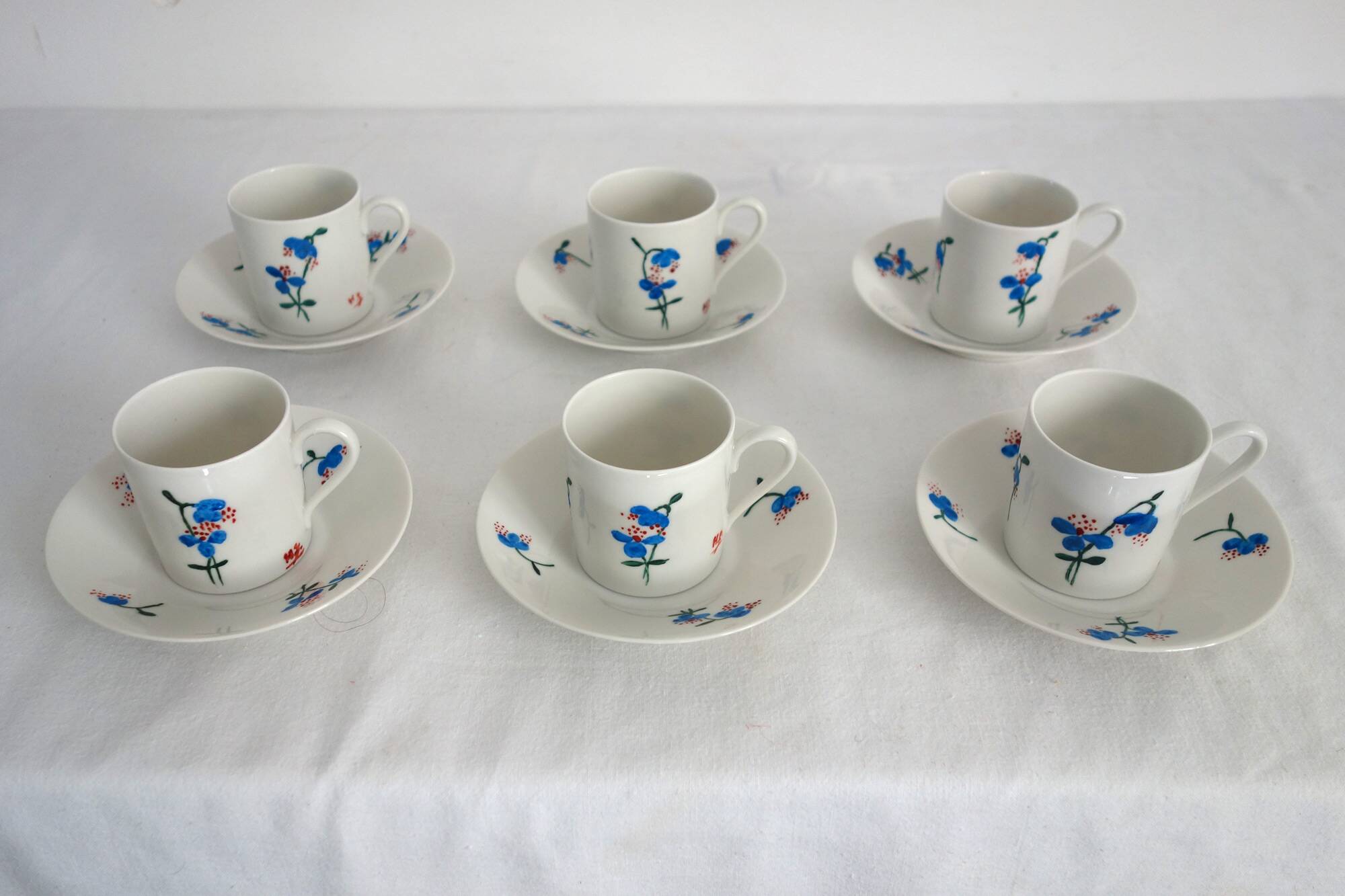 6 Limoges porcelain coffee cups, hand decorated, 1930s