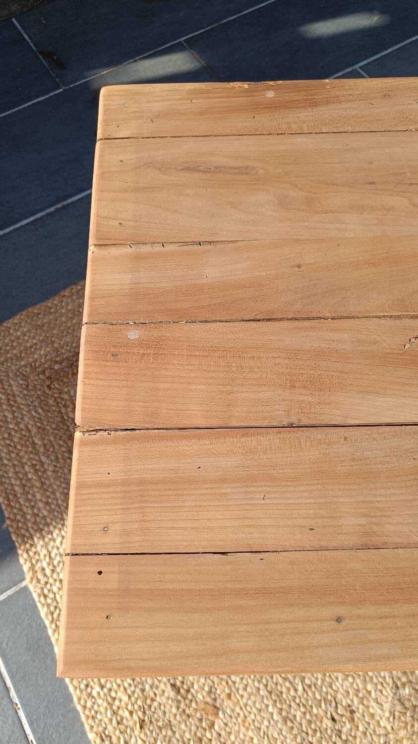 Low farmhouse table in raw wood