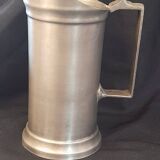 Set of 3 pewter pitchers 95%