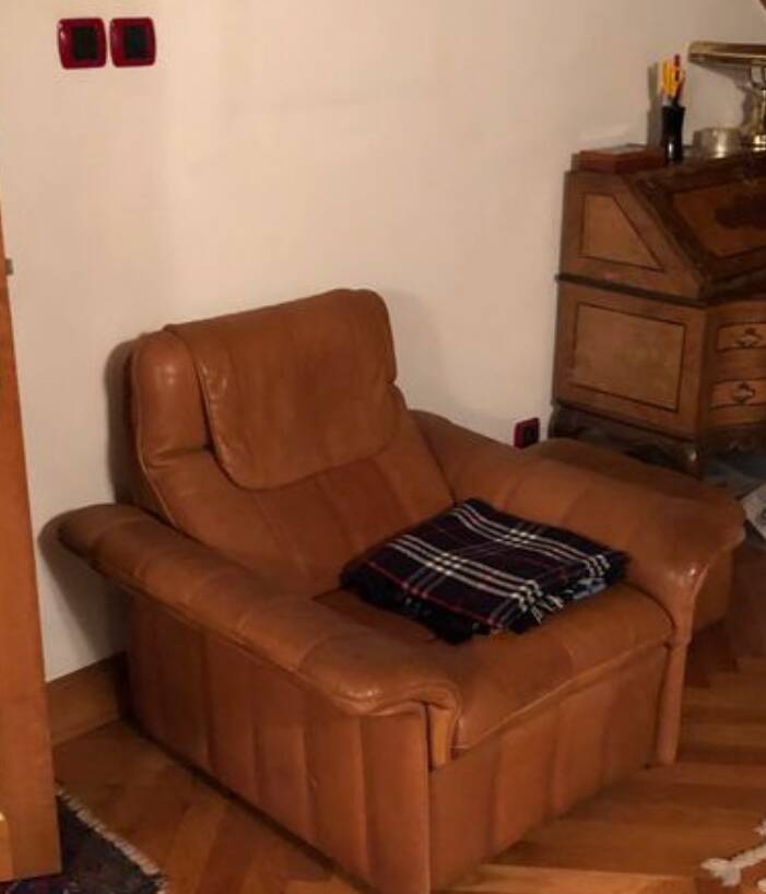 Armchair and footrest