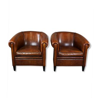 Set of 2 club chairs in black piping sheep leather