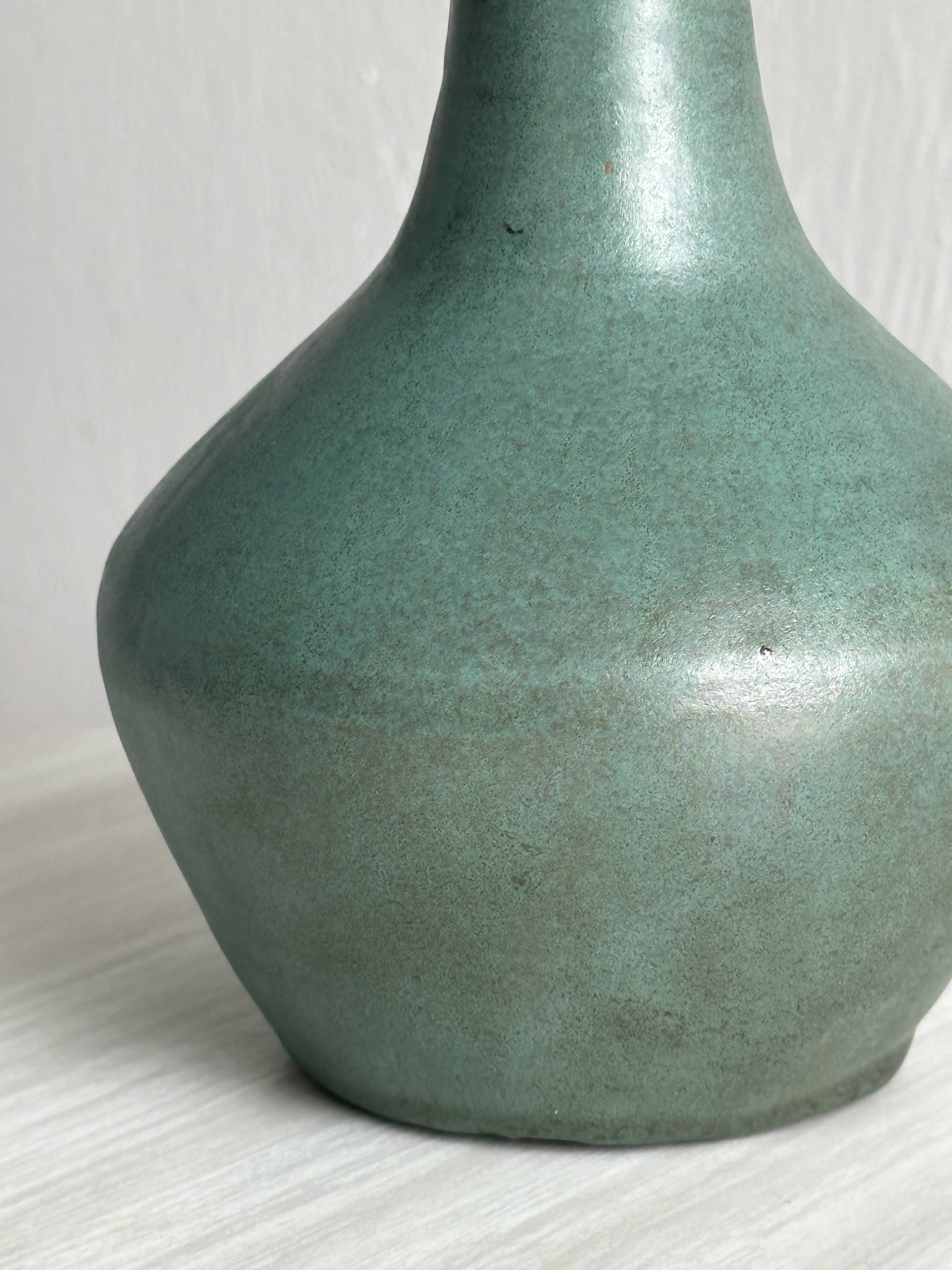 Green glazed ceramic vase