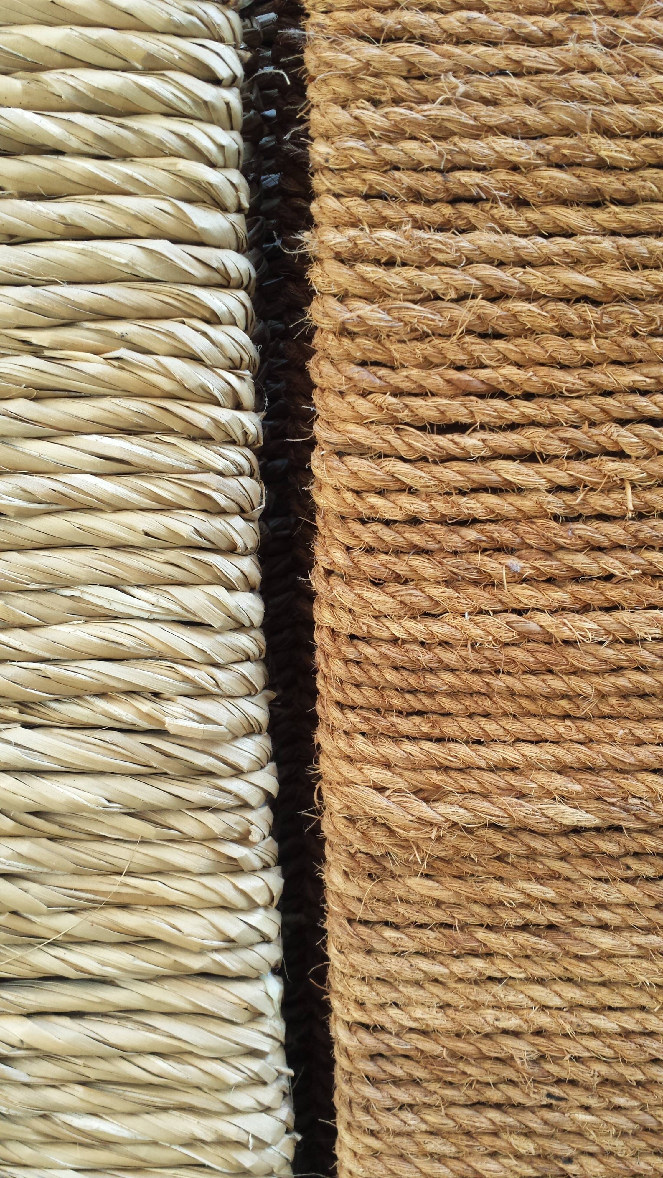 Straw and woven rope screen with metal structure