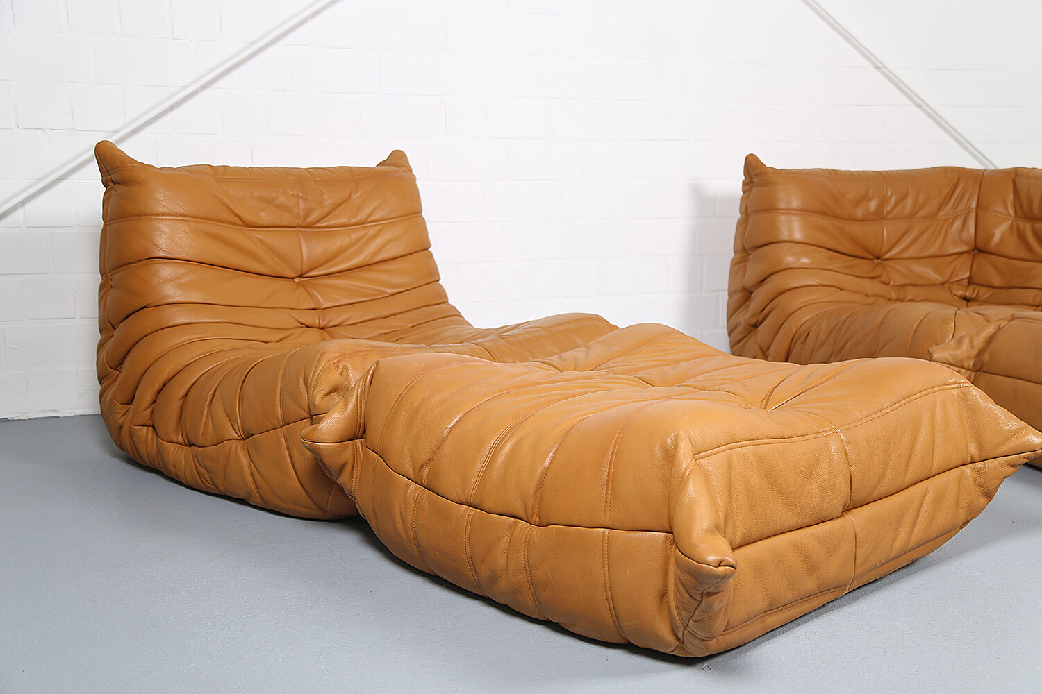 Cognac leather Ligne Roset Togo set from 2010 designed by Michel Ducaroy