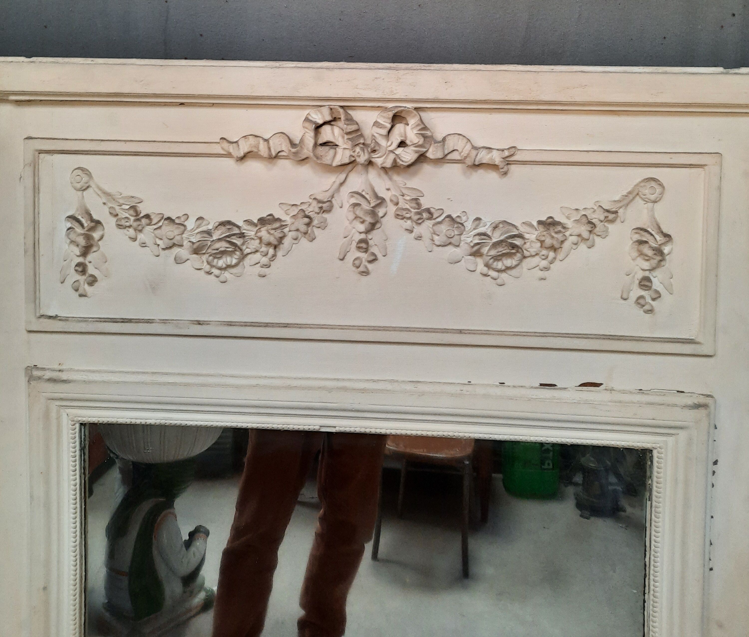 White painted wood paneling mirror