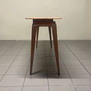 Console from the 1950s with a pink marble top and a cherry wood frame.