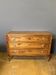 Louis XVI period commode in light walnut.