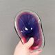 Beautiful dish/bowl in many coloured glass.