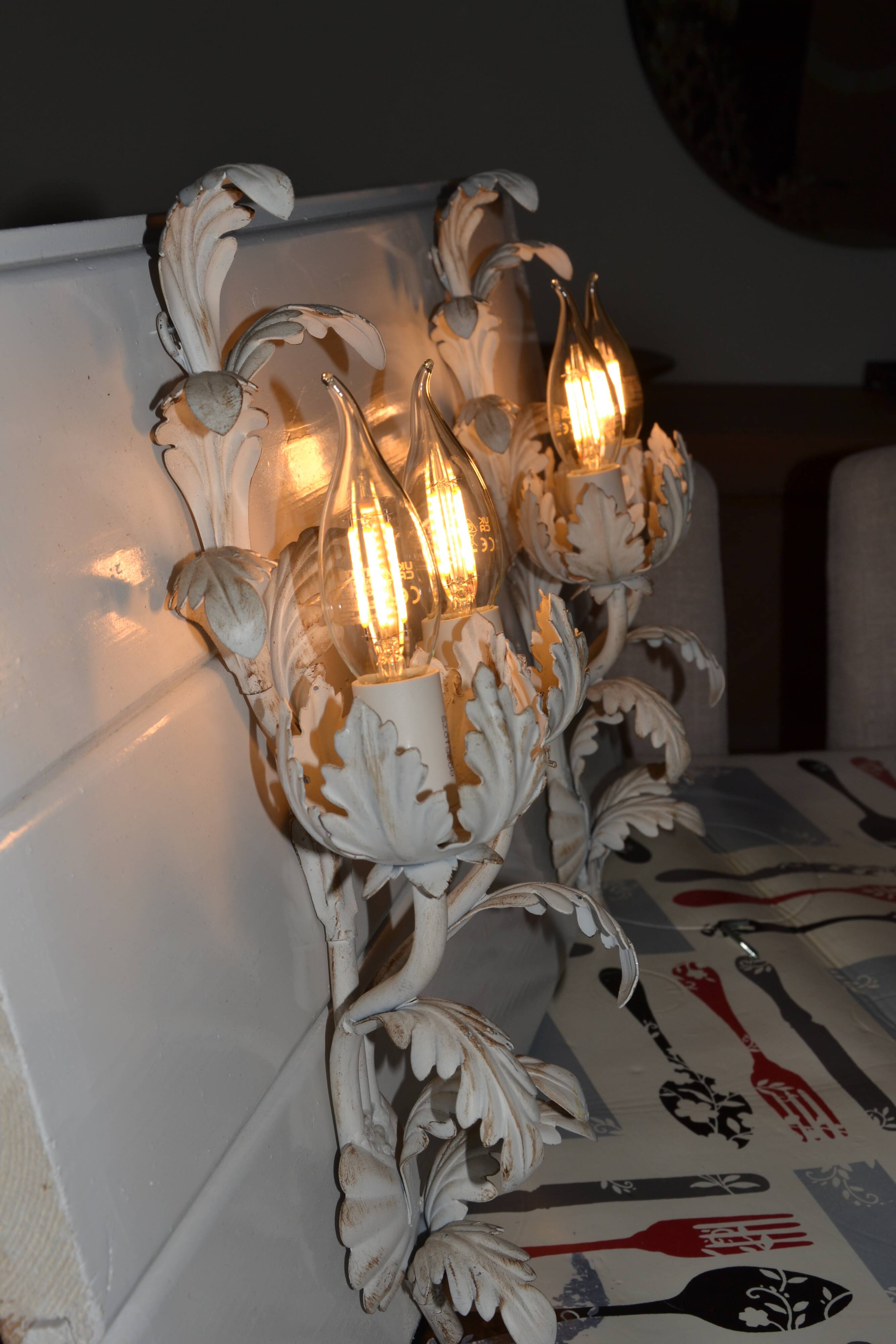 2 Florentine metal leaf wall lights