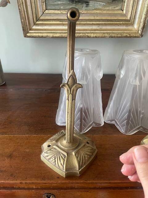 Pair of Art Deco wall sconces in frosted molded glass