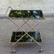 Mid-Century 1978 brass and black smoked glass wheeled dessert trolley.