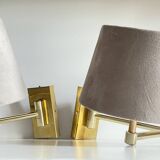 articulated brass and velvet wall light