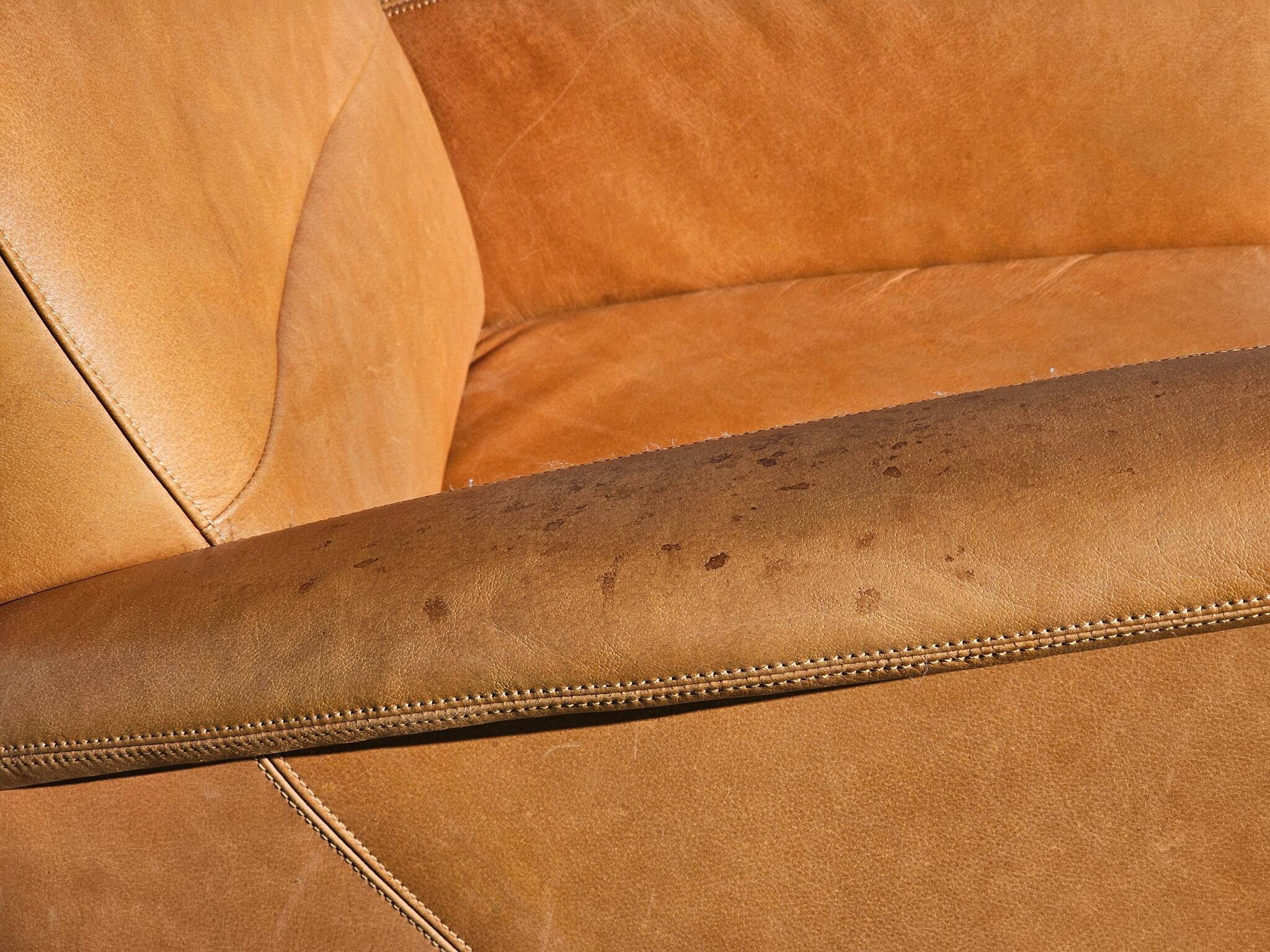 Armchair + matching ottoman – leather – 2000
