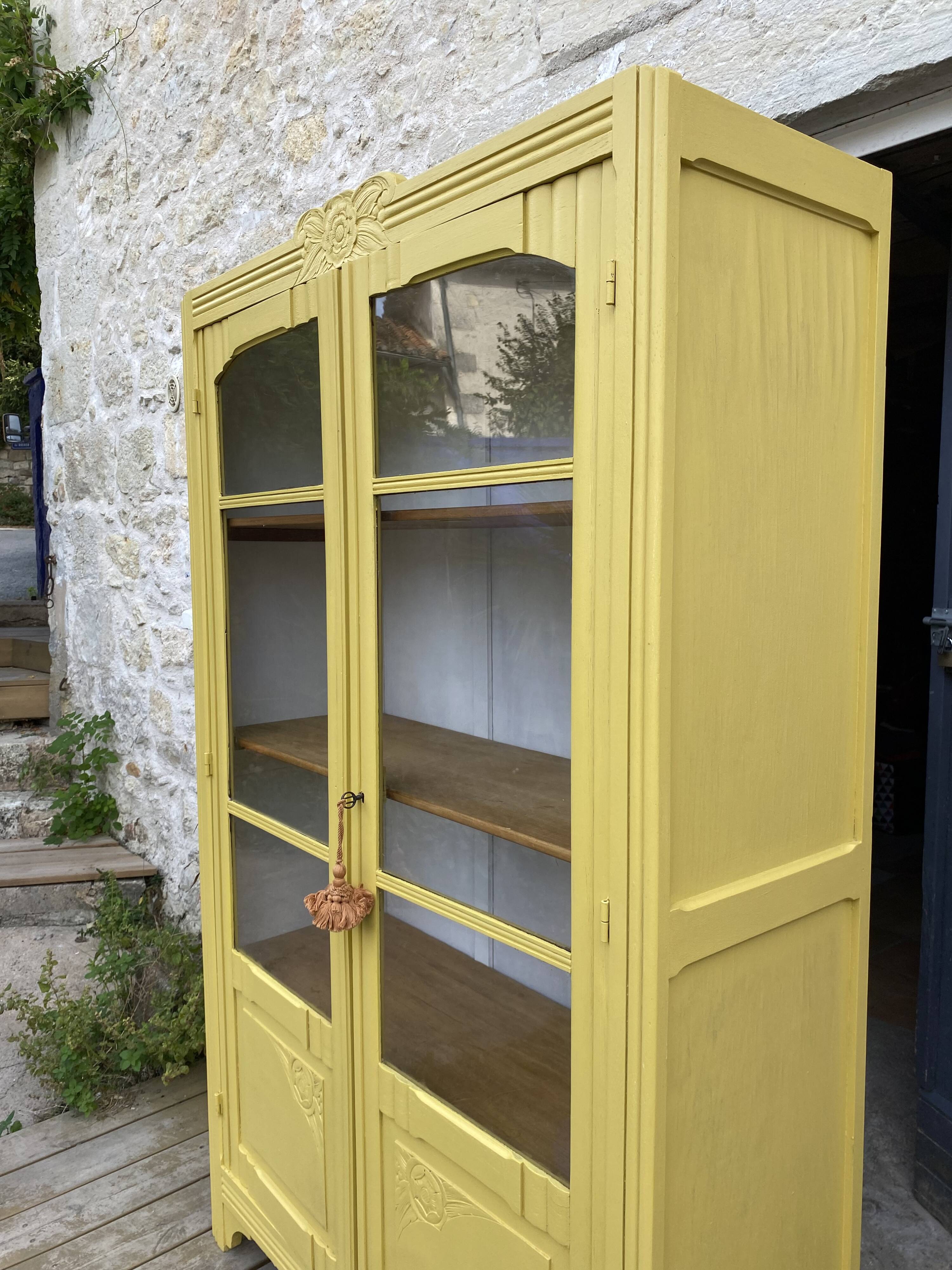 Antique yellow display cabinet