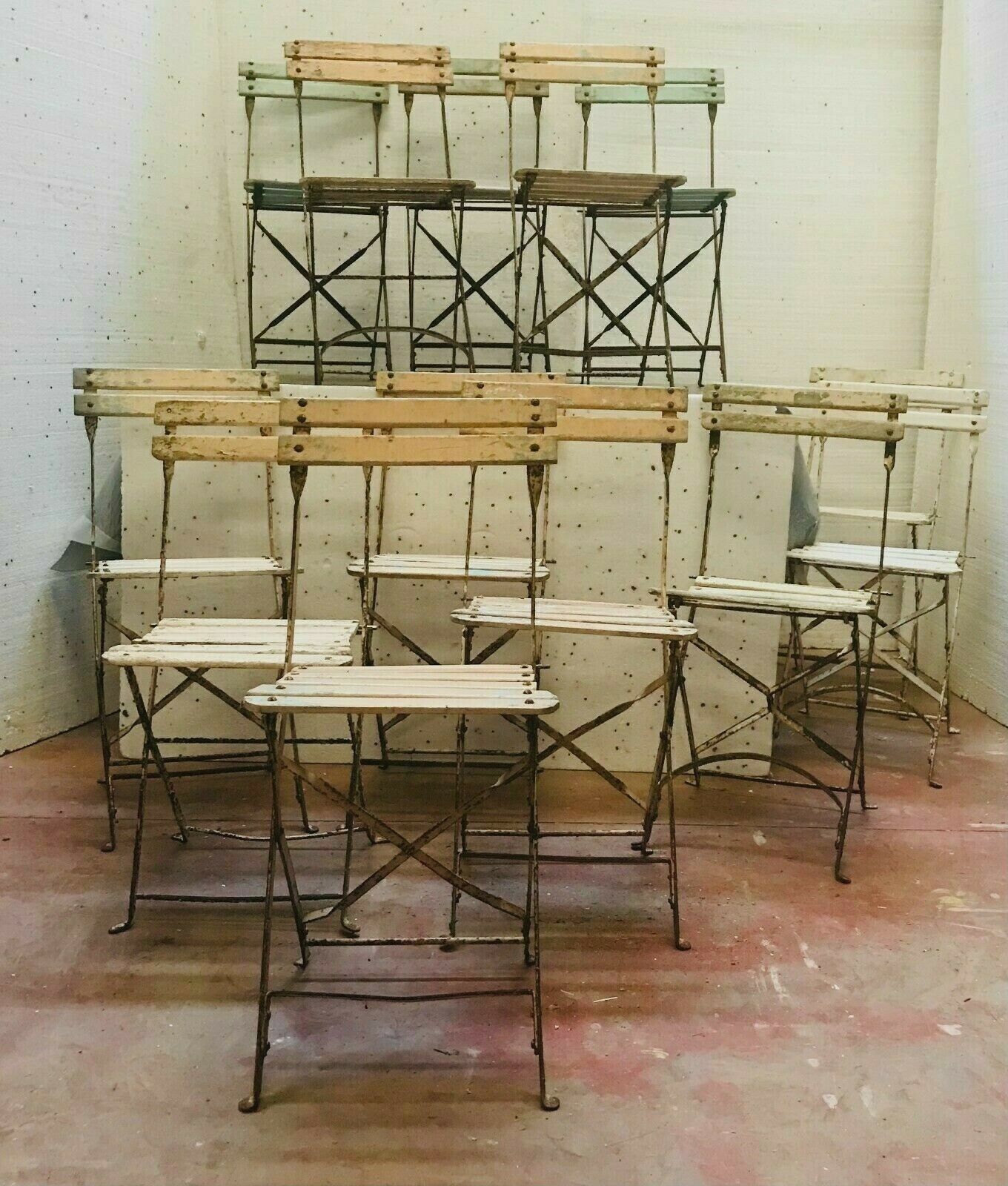 Folding chairs in iron and wooden blade XX century